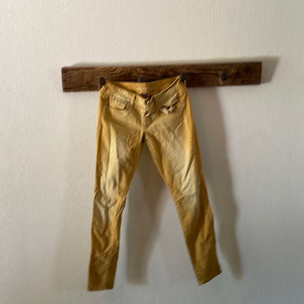 American Eagle distressed skinny crop stretch in mustard yellow